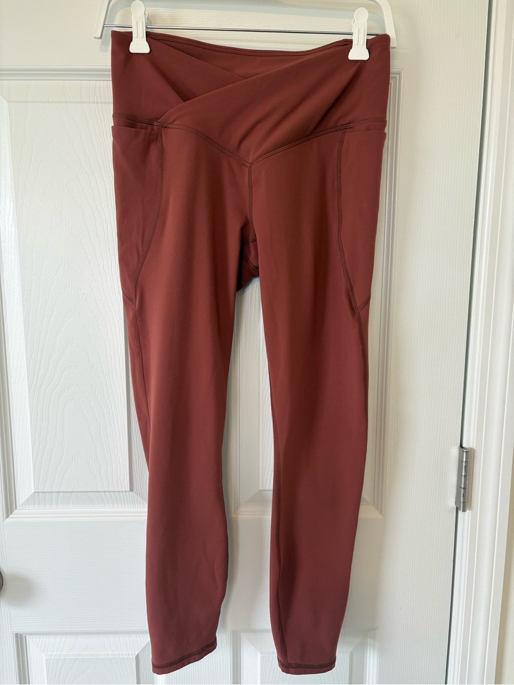 Fabletics Crossover waist Performance Leggings in Rust